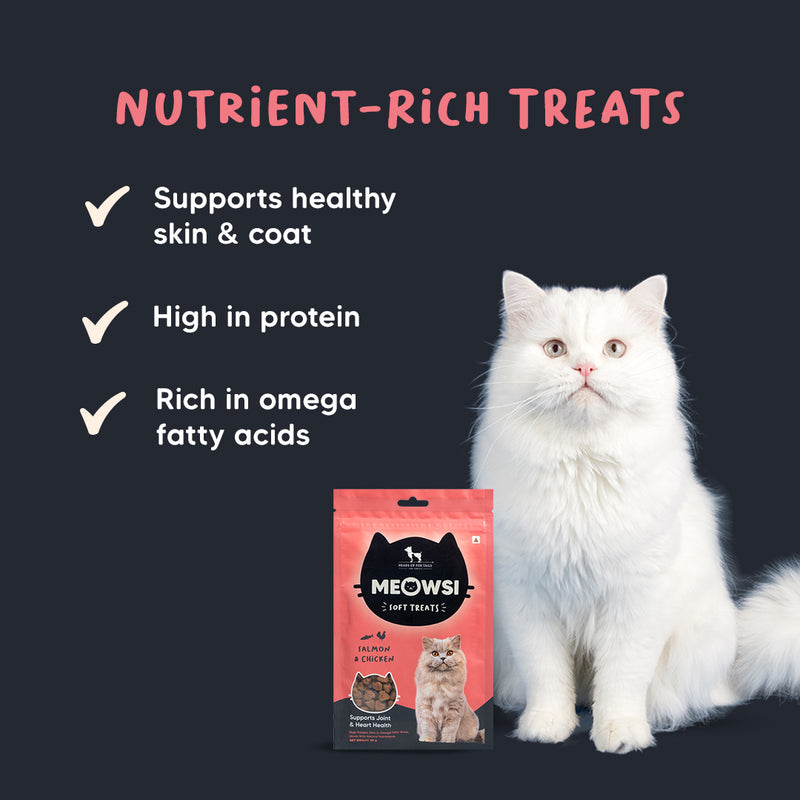Meowsi by HUFT Salmon & Chicken Soft Cat Treats, 50 gm, features a pink packaging with a cat graphic and treats displayed.