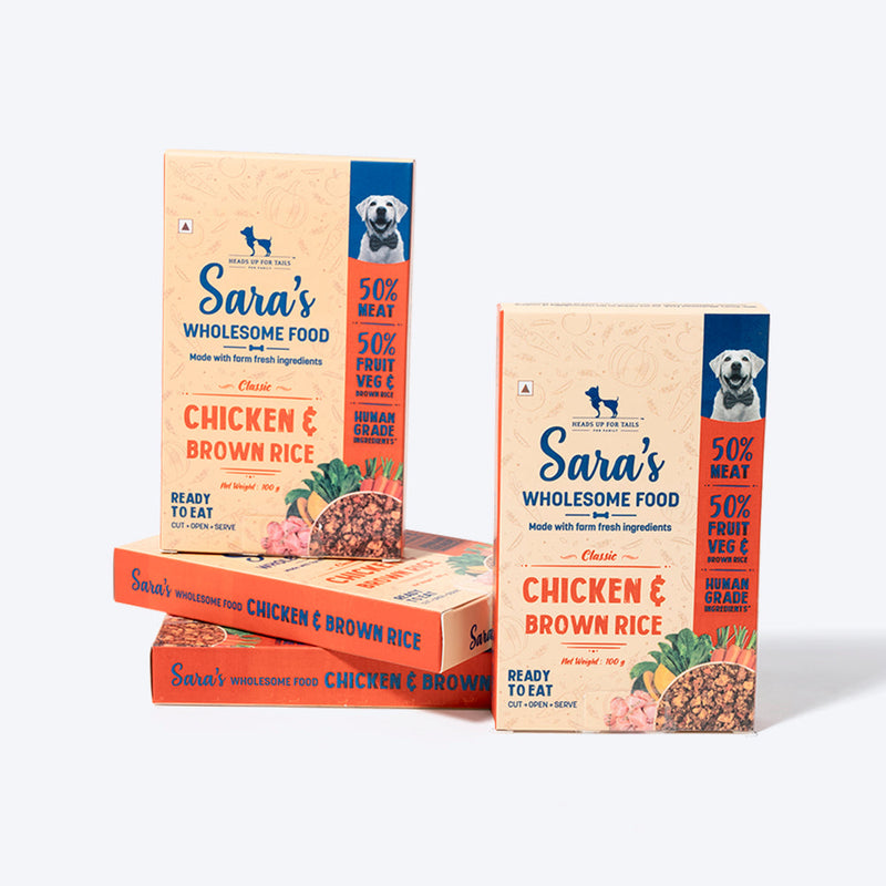 Sara's Wholesome Classic Chicken and Brown Rice Dog Food, 300g, made with 50% meat and 50% fruits and vegetables.