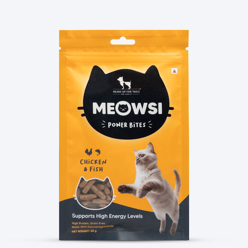 Meowsi by HUFT Chicken & Fish Power Bites, 50 gm, high-protein cat treats in a yellow packaging with a playful cat graphic.