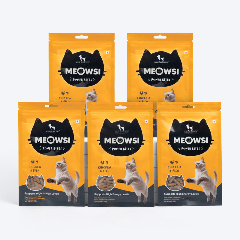 Meowsi by HUFT Chicken & Fish Power Bites, 50 gm, high-protein cat treats in a yellow packaging with a playful cat graphic.