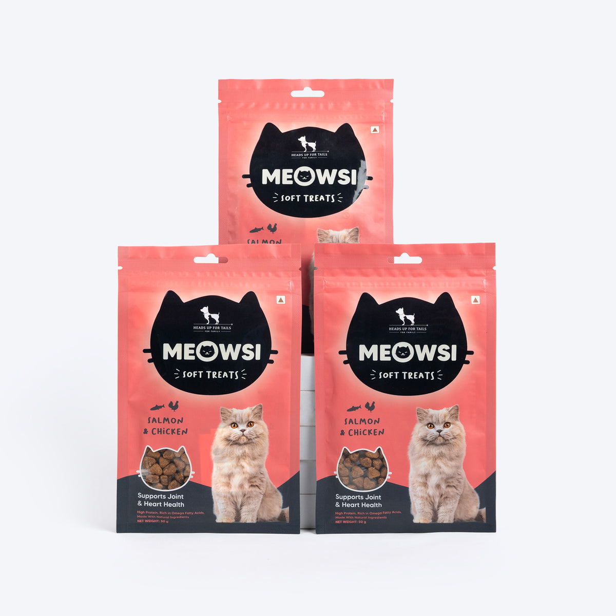 Meowsi by HUFT Salmon & Chicken Soft Cat Treats, 50 gm, features a pink packaging with a cat graphic and treats displayed.