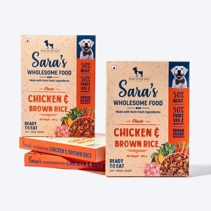 Sara's Wholesome Classic Chicken and Brown Rice Dog Food, 300g, made with 50% meat and 50% fruits and vegetables.
