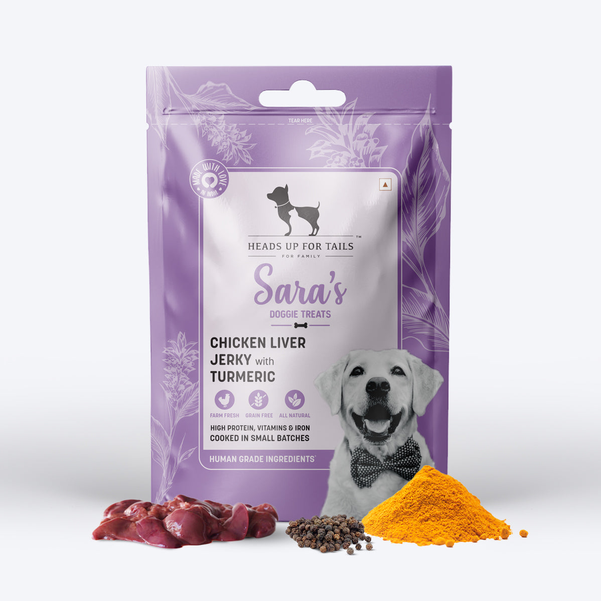 Sara's Doggie Treats Chicken Liver Jerky with Turmeric, 70 g, featuring a purple packaging and images of ingredients.